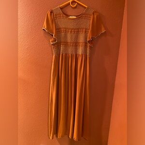 Beautiful copper colored dress! Size L (true to size) dress only worn 1 time.